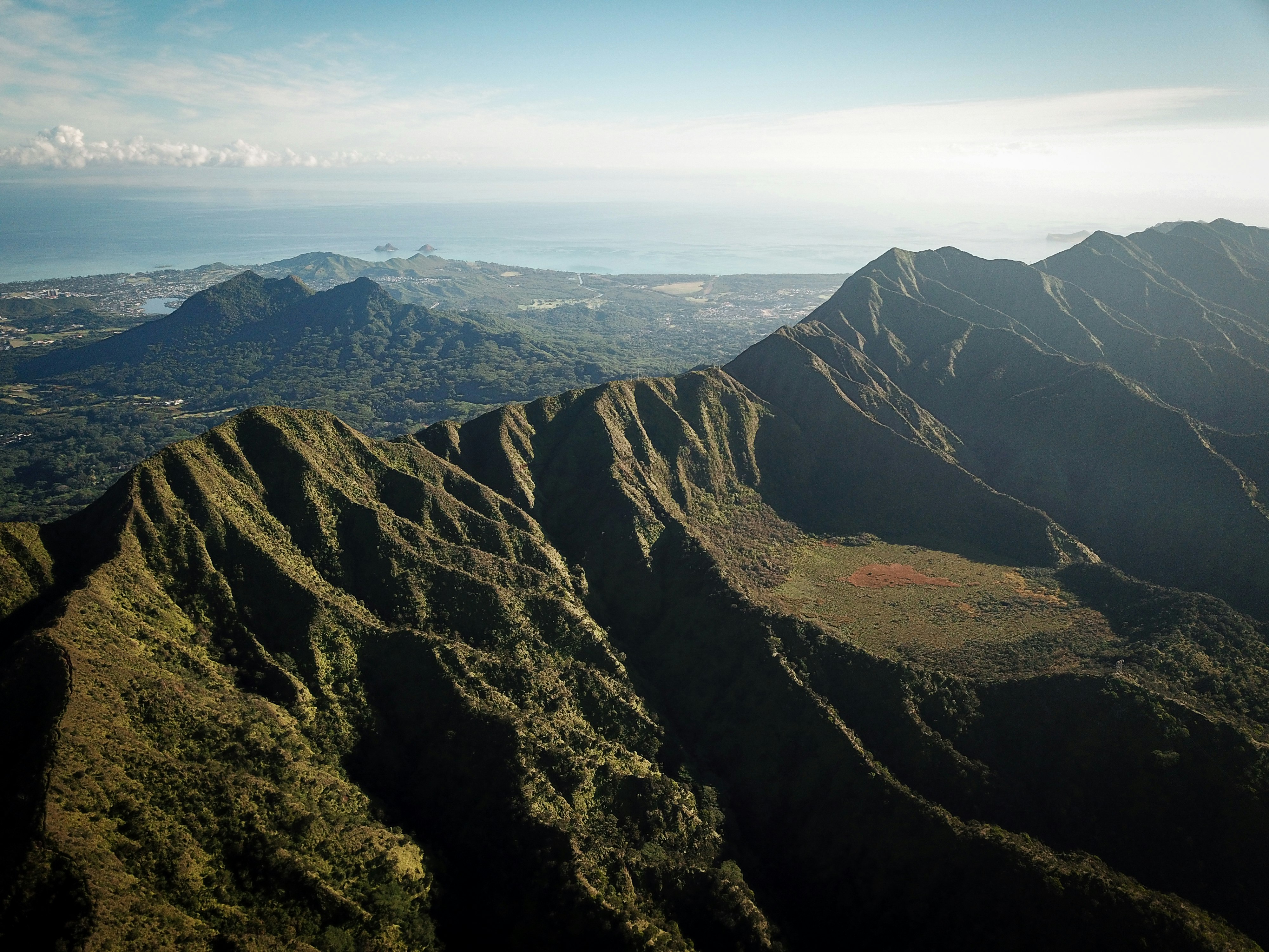 landscape photography of mountains surrounded by trees